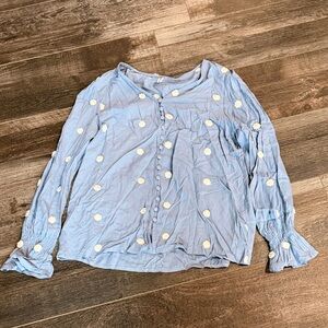 Blue Blouse with White Floral Accents